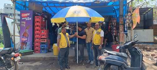 Lions Umbrella Distribution by LCB Orissa